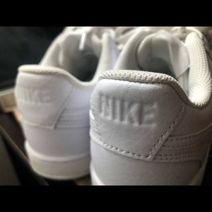 All white Nike sneaker